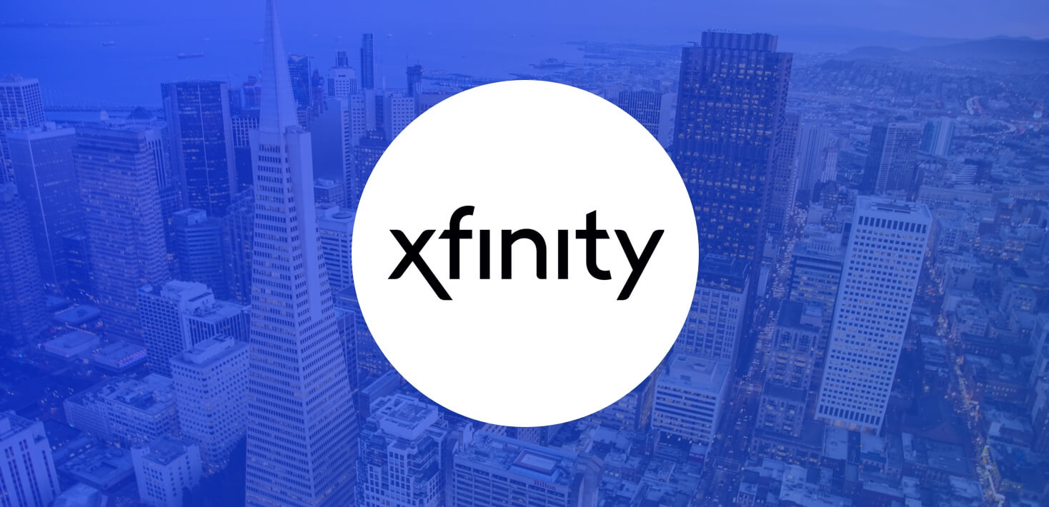 Xfinity logo over San Francisco city skyline.